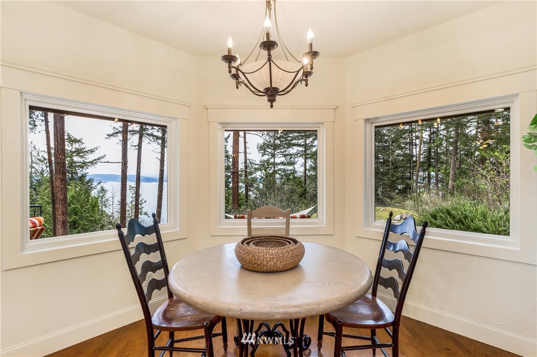 764 Big Foot Road Friday Harbor, WA 98250 - Photo 10 of 34 a view of a dining room with furniture window and outside view