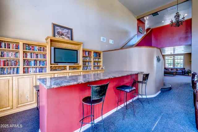 a view of a lake with houses in the back