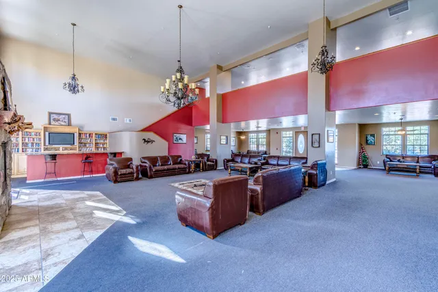 a view of a house with a yard and a street