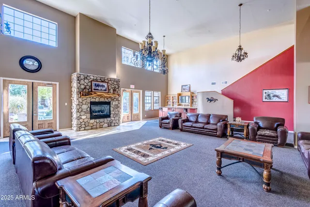 a view of a swimming pool with an outdoor space and seating area