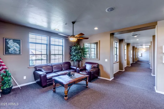 a view of street along with house and trees