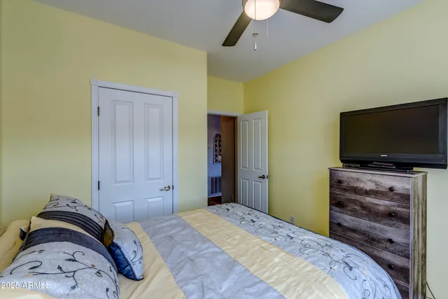 a bathroom with a double vanity sink mirror toilet and bathtub