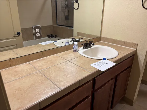 a bathroom with a toilet and a sink
