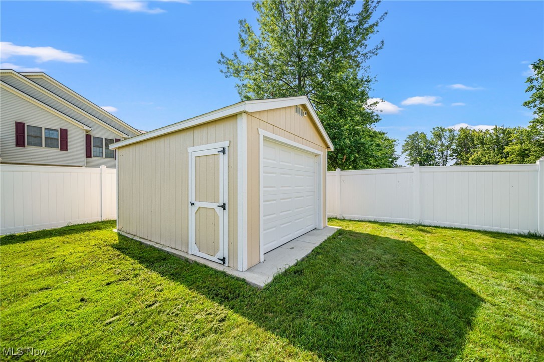 2716 Russell Road Ashtabula, OH 44004 - Photo 40 of 43 View of shed featuring a fenced backyard