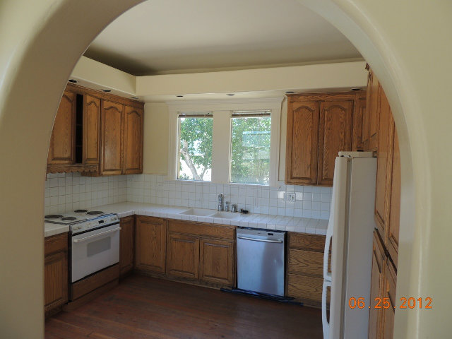 1600 San Juan Road Watsonville, CA 95076 - Photo 5 of 14 a kitchen with stainless steel appliances a sink cabinets and a window