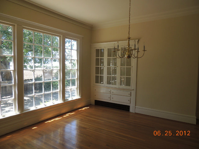 1600 San Juan Road Watsonville, CA 95076 - Photo 6 of 14 a view of empty room with wooden floor and fan