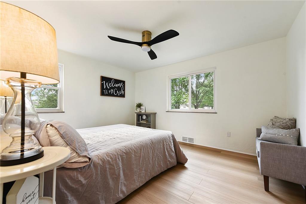 3316 Ivanhoe Road Pittsburgh, PA 15241 - Photo 15 of 37 a bedroom with a bed window and couch