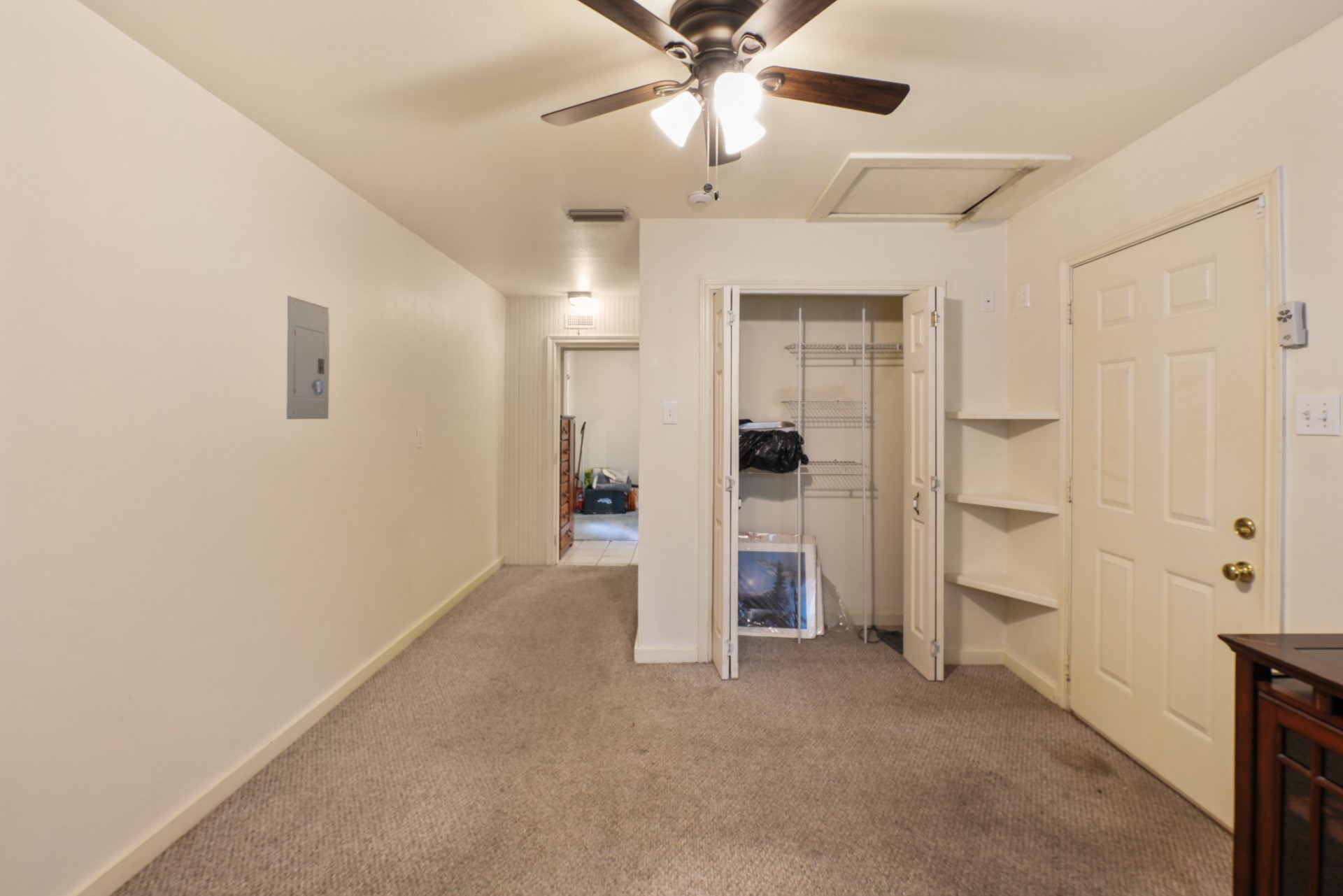 6625 East Post Road Kyle, TX 78640 - Photo 17 of 46 an empty room with closet and a ceiling fan