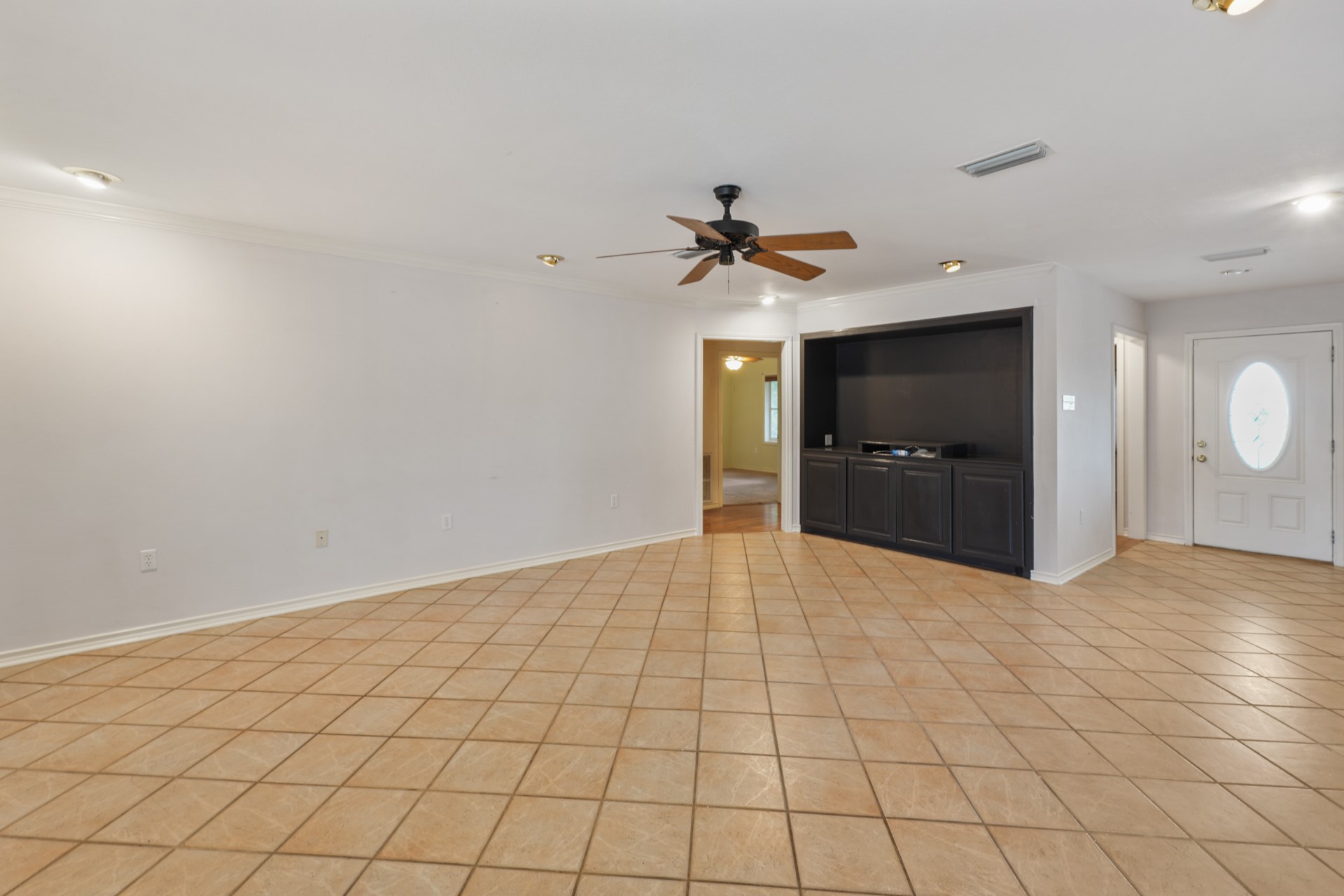 6625 East Post Road Kyle, TX 78640 - Photo 18 of 46 a view of an empty room with a bathroom