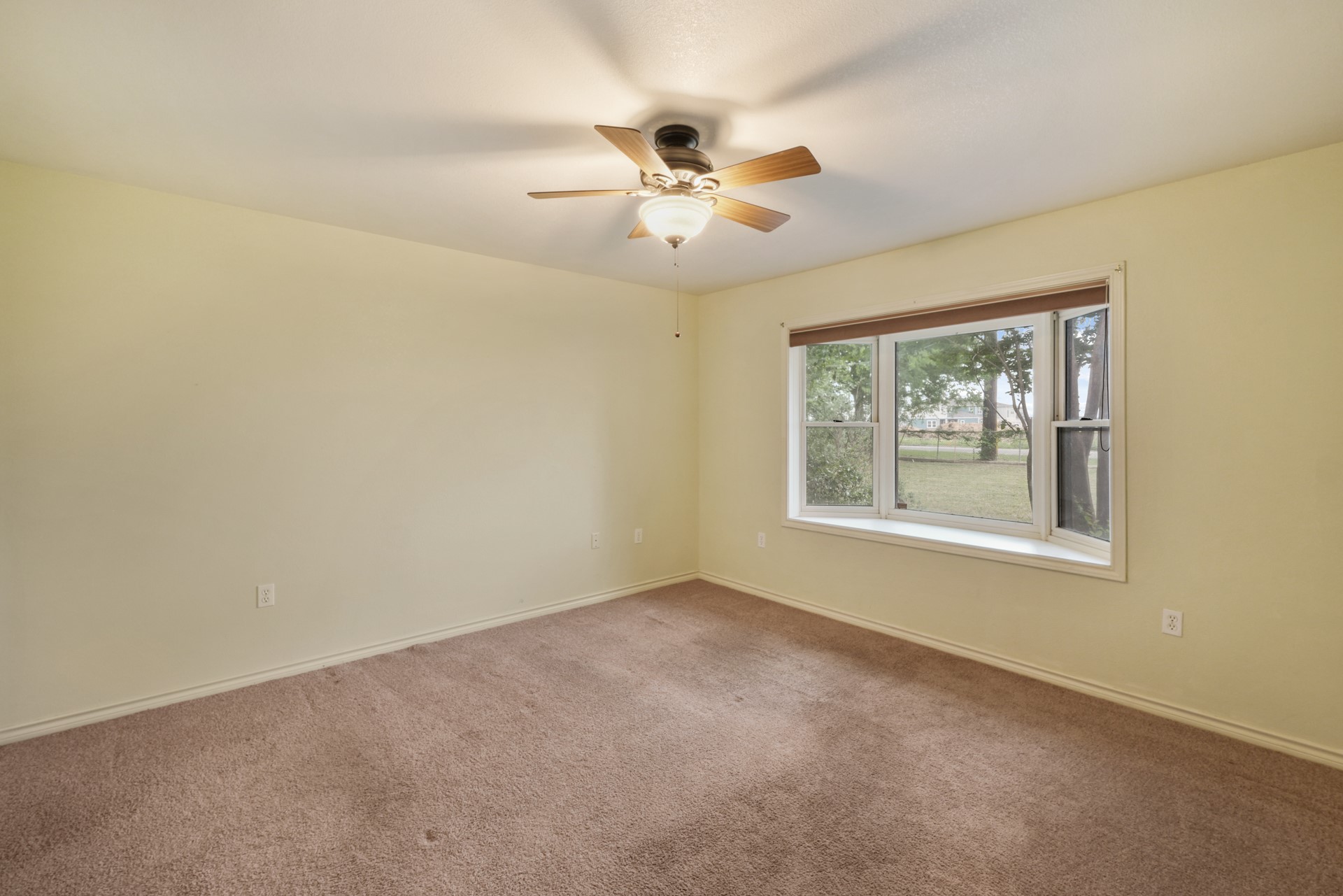 6625 East Post Road Kyle, TX 78640 - Photo 26 of 46 an empty room with a window