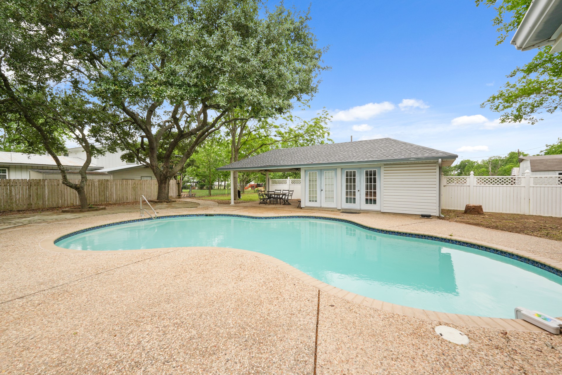 6625 East Post Road Kyle, TX 78640 - Photo 32 of 46 a view of outdoor space yard swimming pool and patio