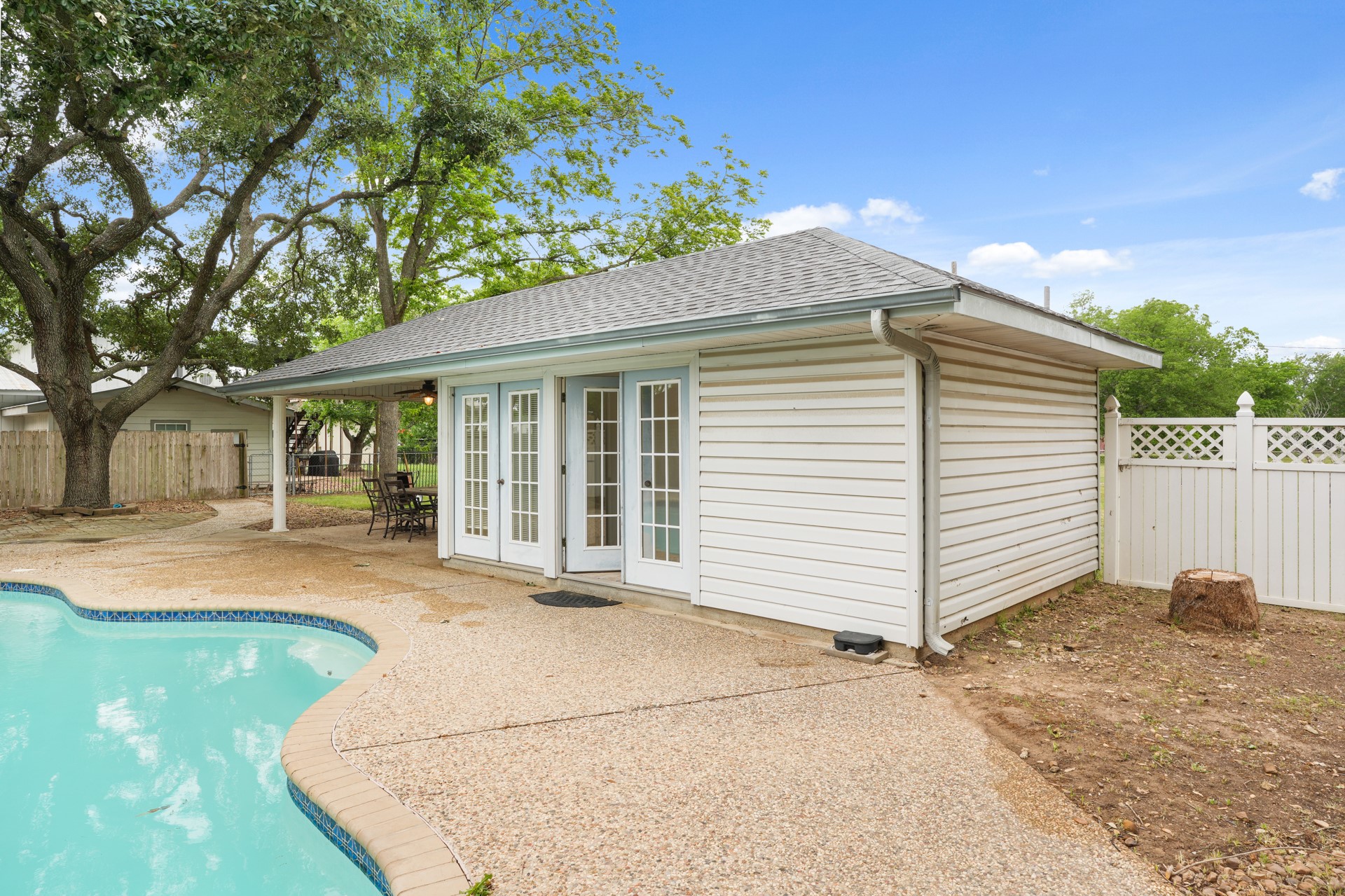 6625 East Post Road Kyle, TX 78640 - Photo 41 of 46 a view of a house with backyard and a tree