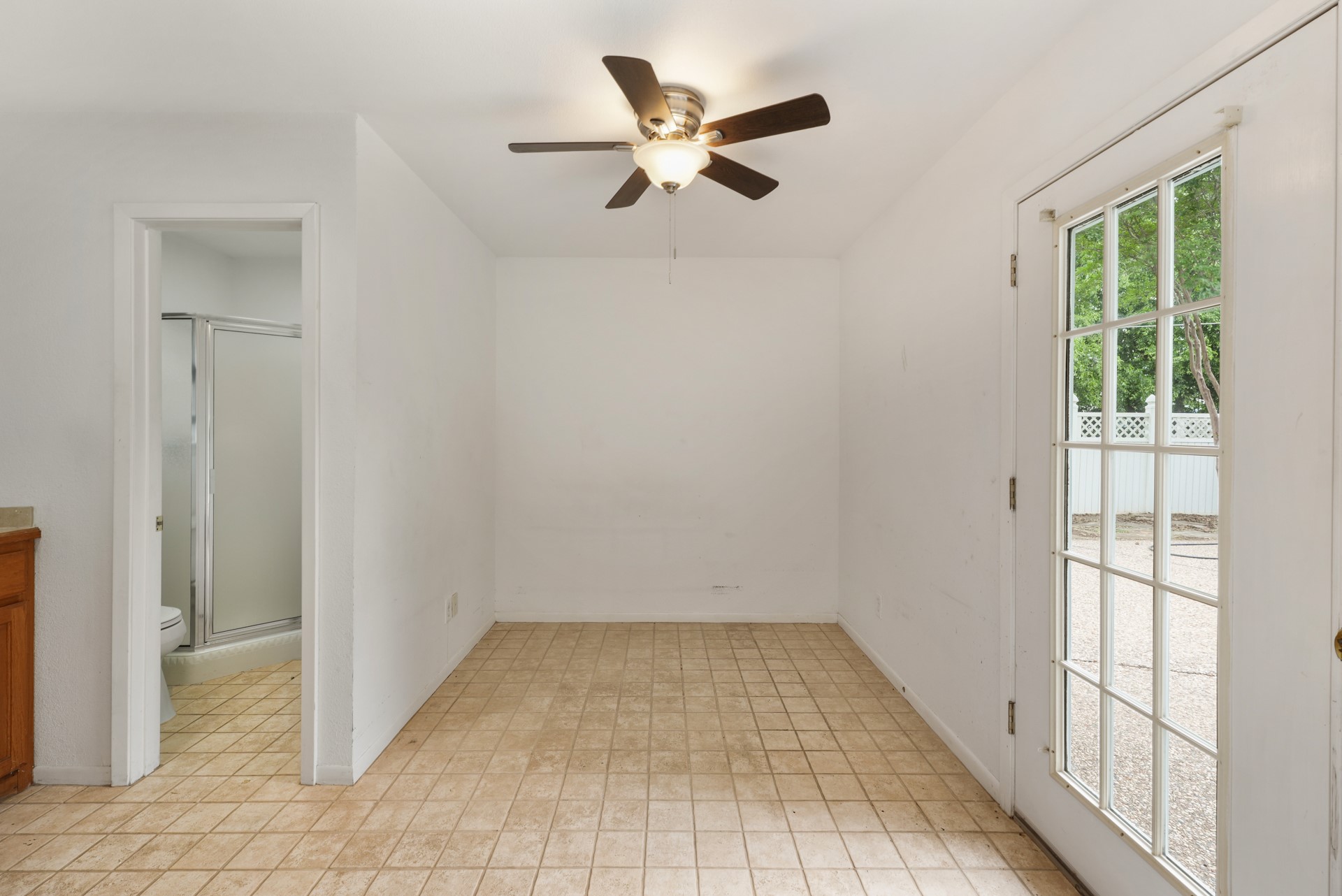 6625 East Post Road Kyle, TX 78640 - Photo 42 of 46 wooden floor in an empty room with a window