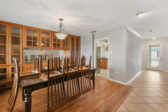 a view of a porch with wooden floor and outdoor space
