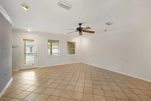 a view of an empty room and window