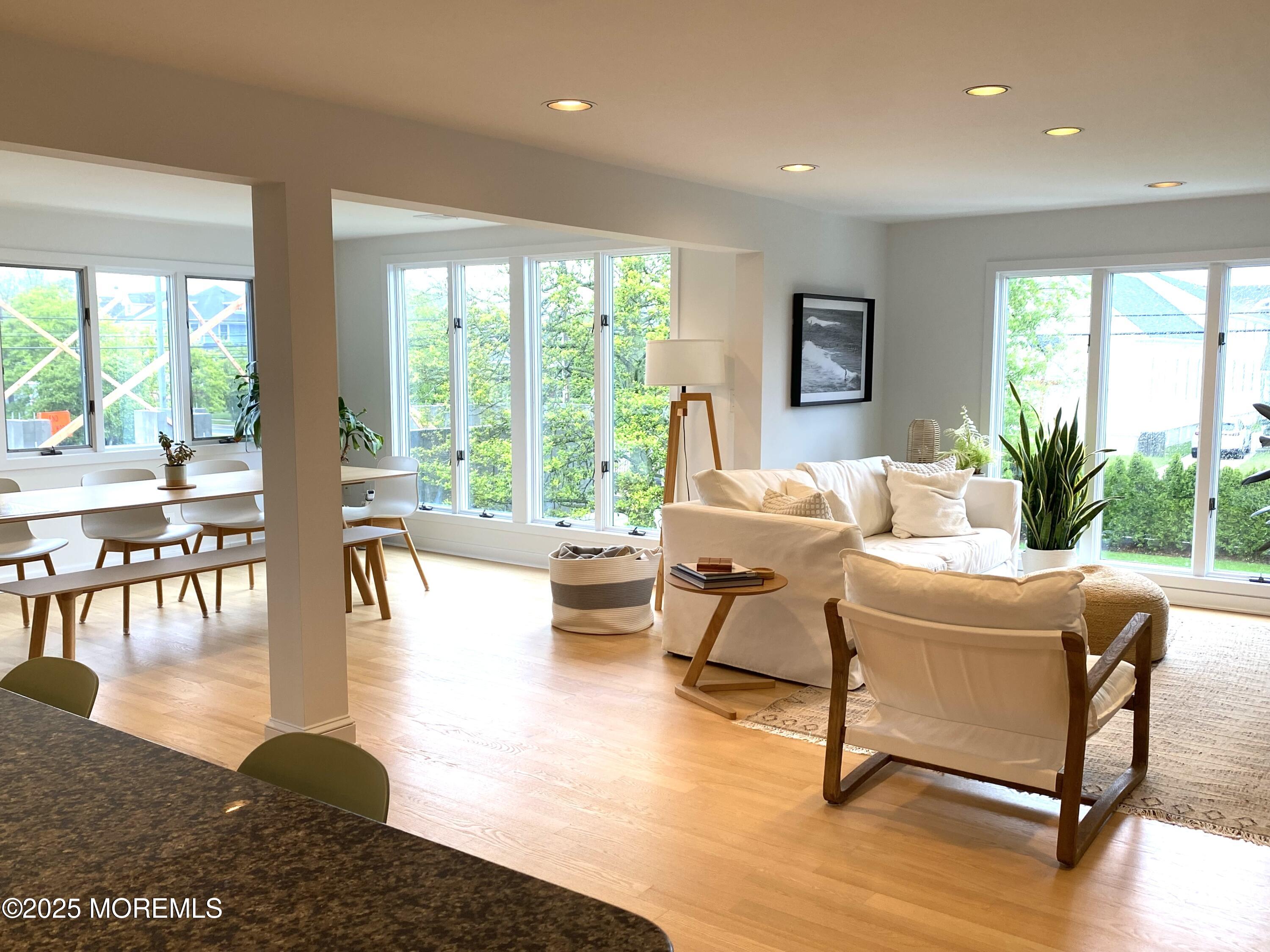 121 Bridge Avenue Bay Head, NJ 08742 - Photo 13 of 22 a living room with furniture and a large window