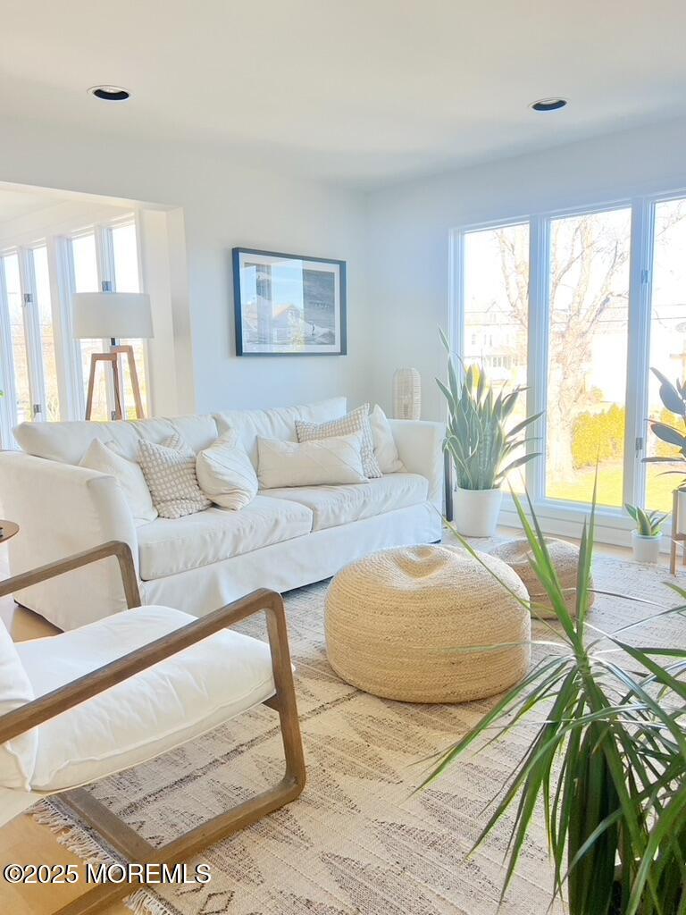 121 Bridge Avenue Bay Head, NJ 08742 - Photo 3 of 22 a living room with furniture and a large window