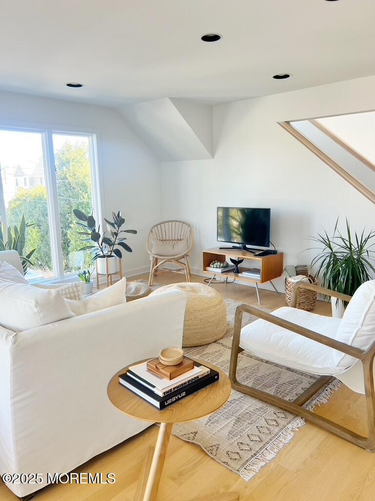 121 Bridge Avenue Bay Head, NJ 08742 - Photo 4 of 22 a living room with furniture and a flat screen tv