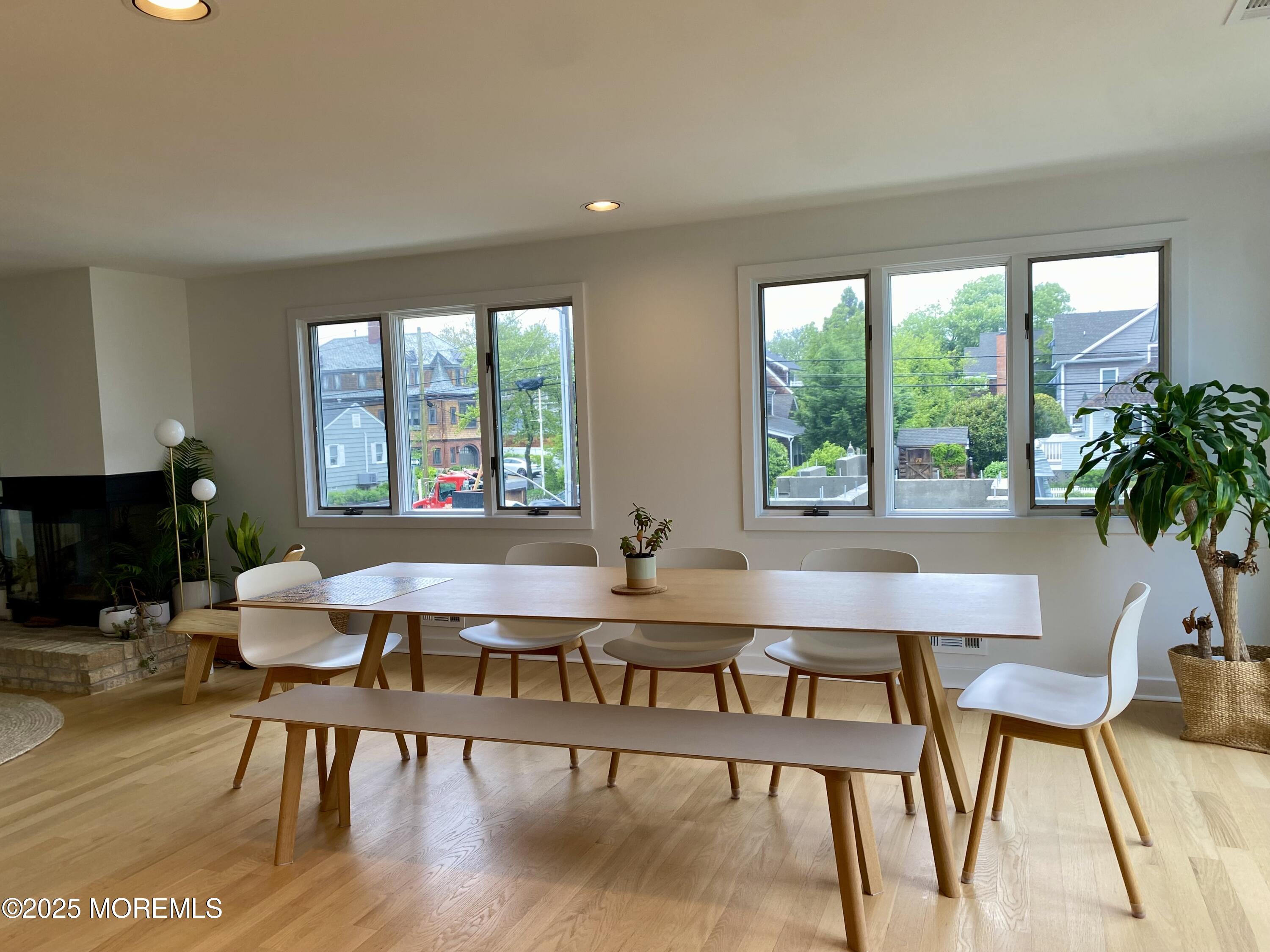 121 Bridge Avenue Bay Head, NJ 08742 - Photo 6 of 22 a view of a dining room with furniture window and wooden floor