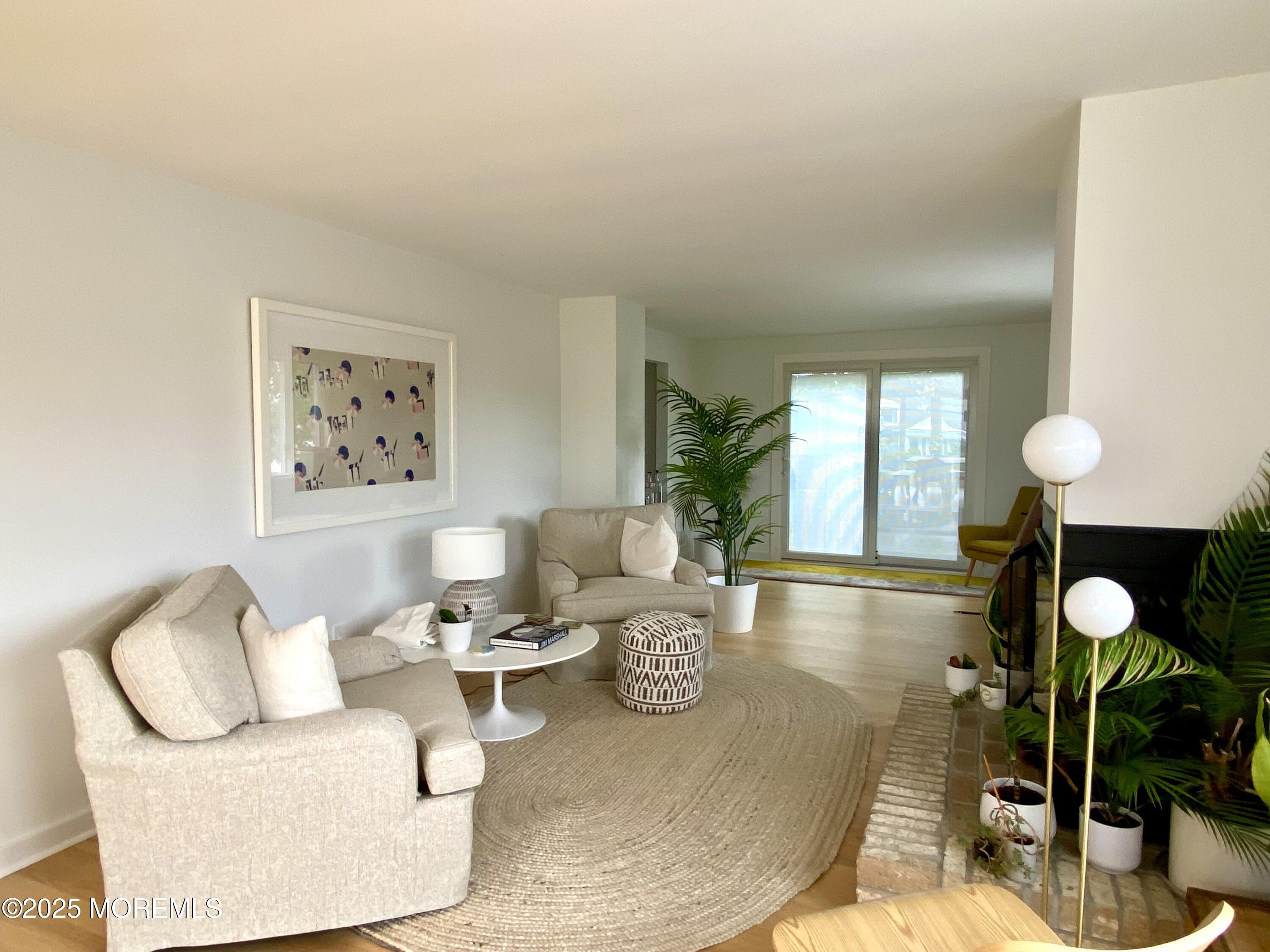121 Bridge Avenue Bay Head, NJ 08742 - Photo 8 of 22 a living room with furniture and window