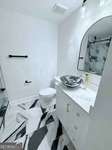 a view of living room with washer and dryer