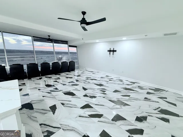 a bed room with a bed and a window