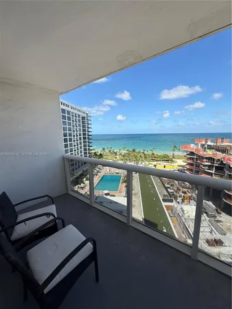 a view of a balcony with an outdoor space