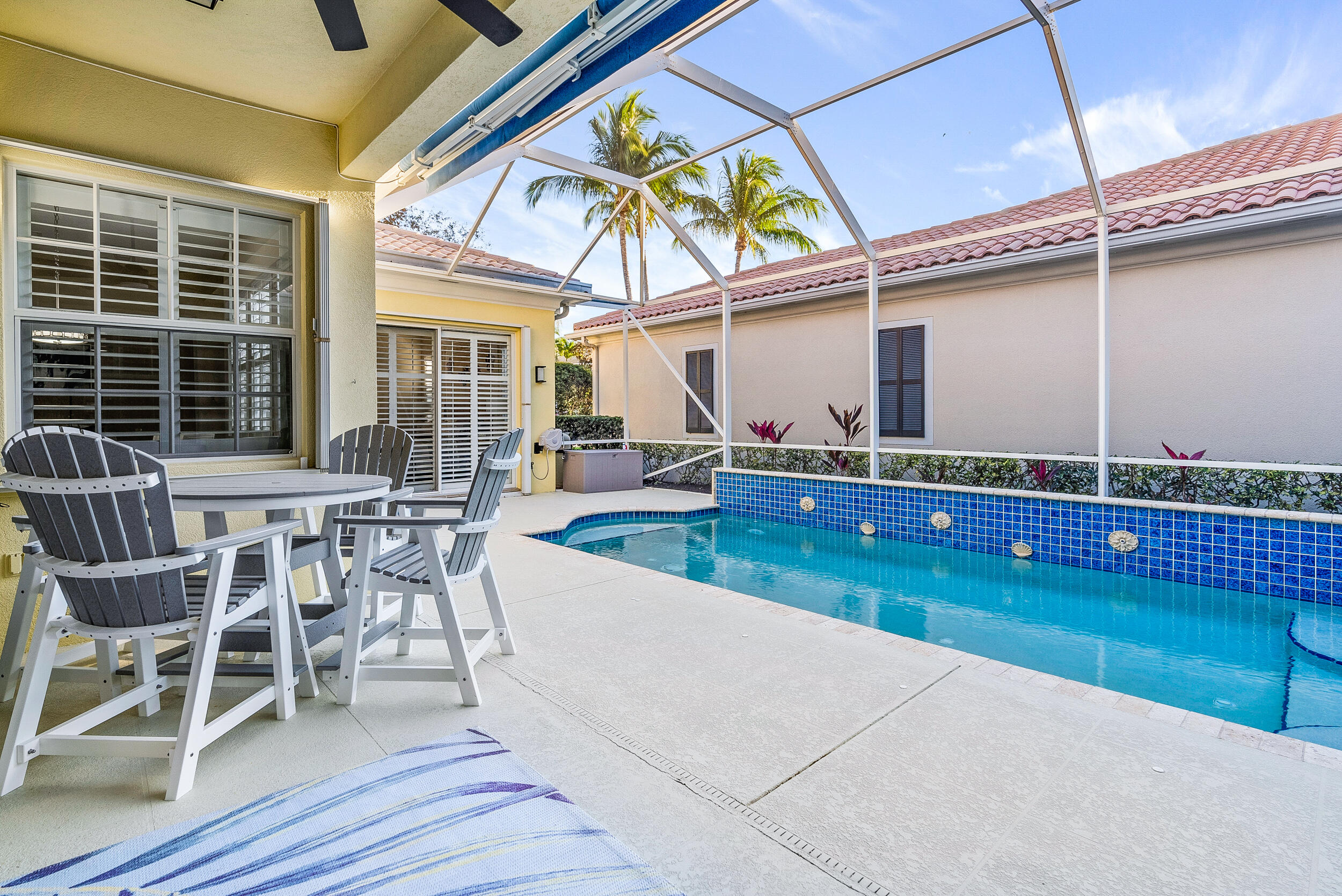 221 Florence Drive Jupiter, FL 33458 - Photo 26 of 28 Loggia & Screened in Patio