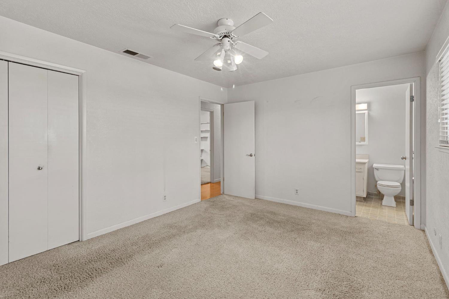 1428 Kent Way Modesto, CA 95355 - Photo 14 of 27 The primary bedroom, with its own bath, will be a private oasis with a few cosmetic touches.