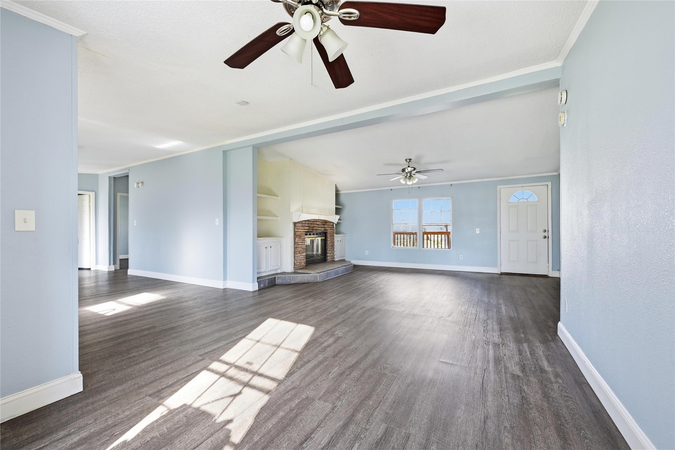 39512 Donigan Road Brookshire, TX 77423 - Photo 11 of 15 a view of an empty room with window and wooden floor