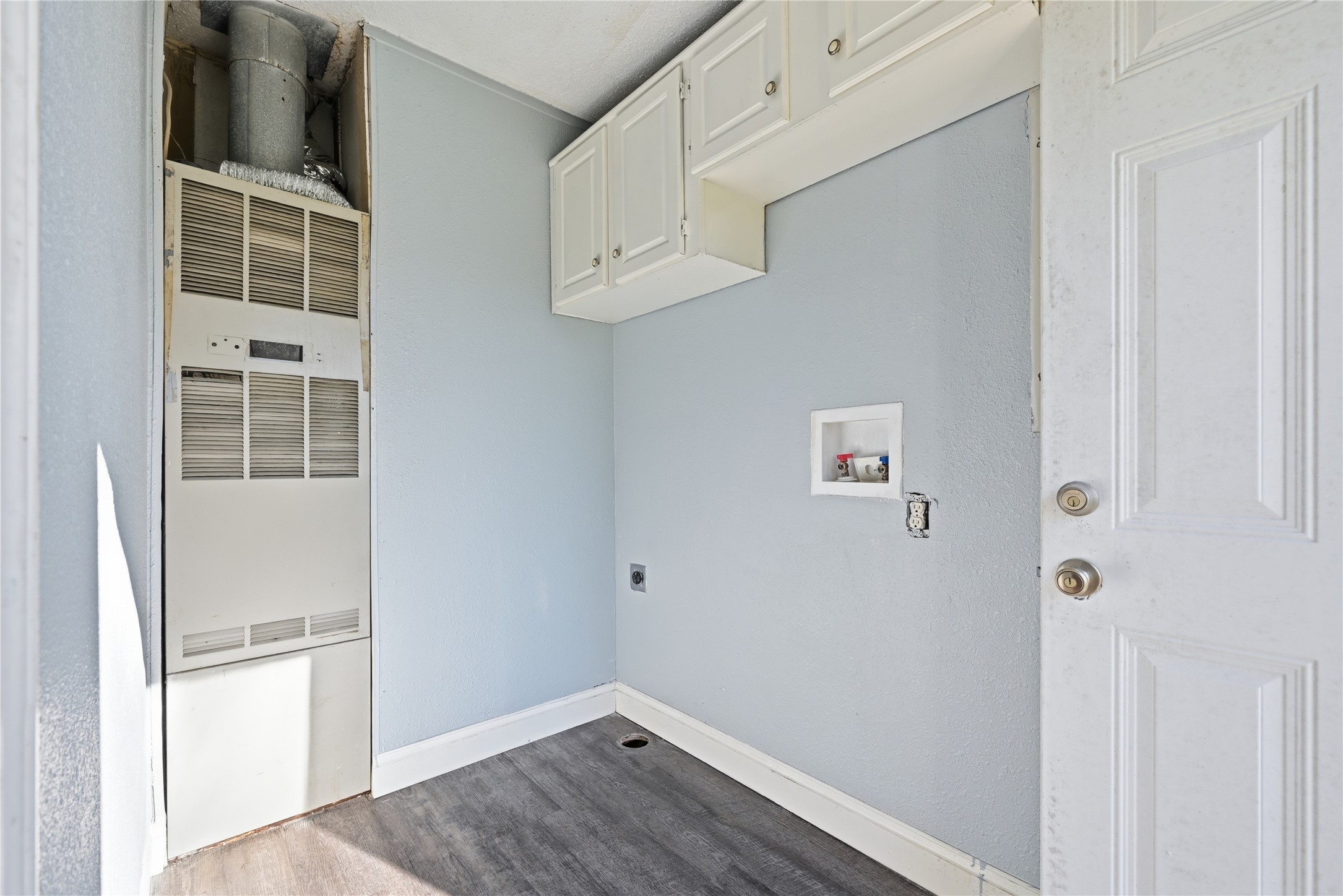39512 Donigan Road Brookshire, TX 77423 - Photo 15 of 15 a view of storage and utility room with wooden floor