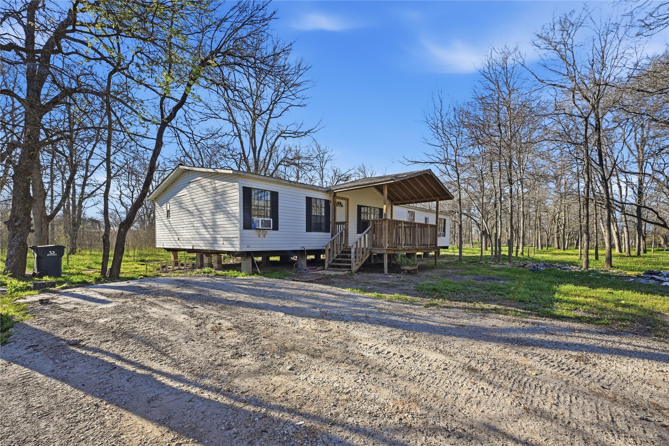 39512 Donigan Road Brookshire, TX 77423 - Photo 2 of 15 a front view of a house with a yard