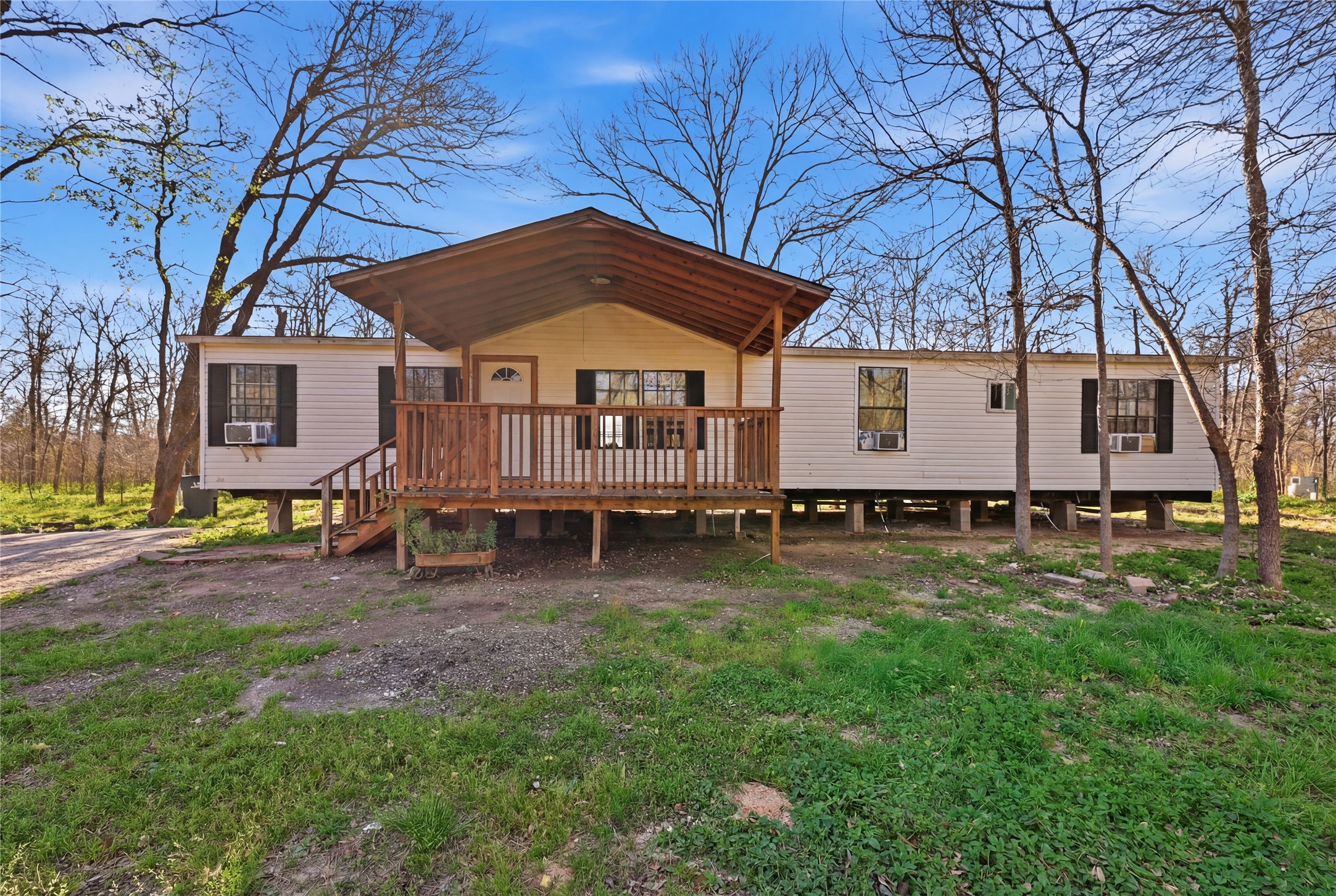 39512 Donigan Road Brookshire, TX 77423 - Photo 3 of 15 a front view of a house with garden