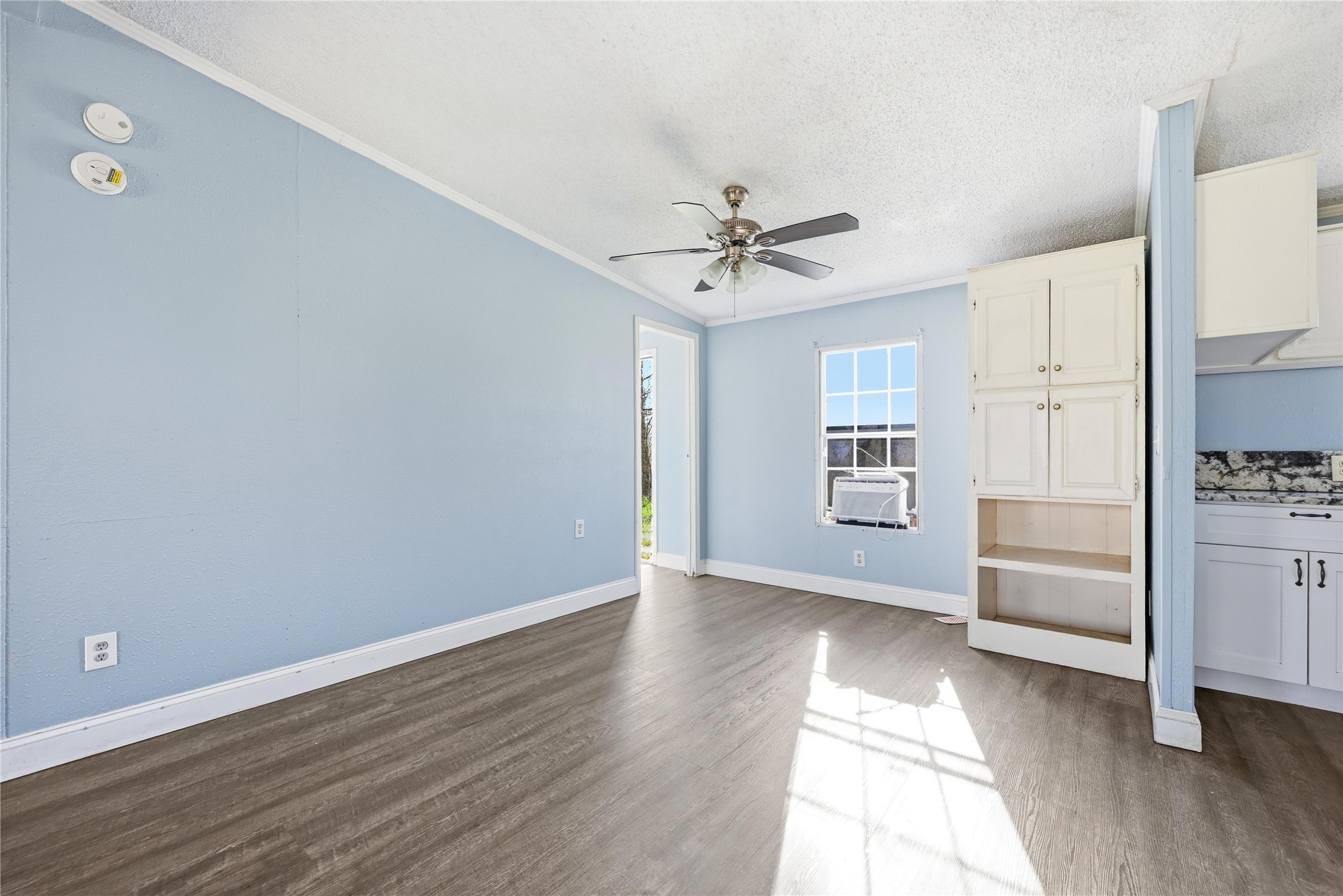 39512 Donigan Road Brookshire, TX 77423 - Photo 10 of 15 wooden floor in an empty room with a window