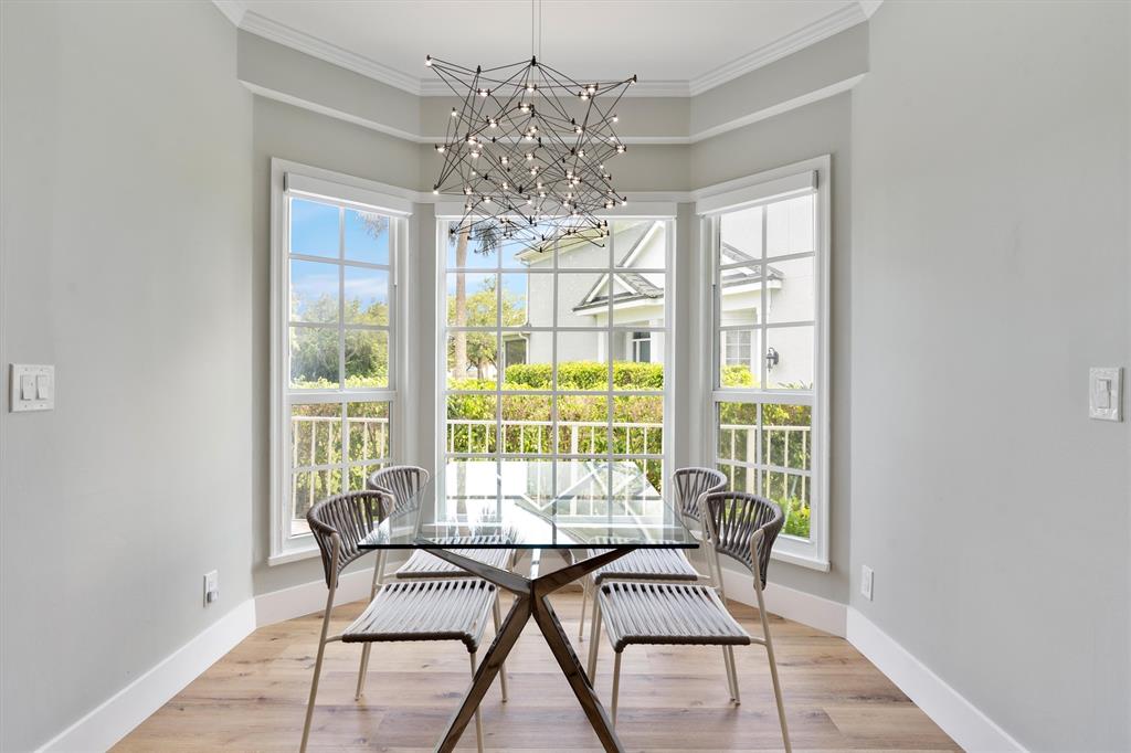 21470 St Andrews Grand Circle, Unit 12 Boca Raton, FL 33486 - Photo 11 of 26 a dining room with furniture and window