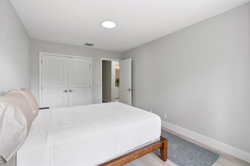 21470 St Andrews Grand Circle, Unit 12 Boca Raton, FL 33486 - Photo 19 of 26 a bedroom with a bed and a window