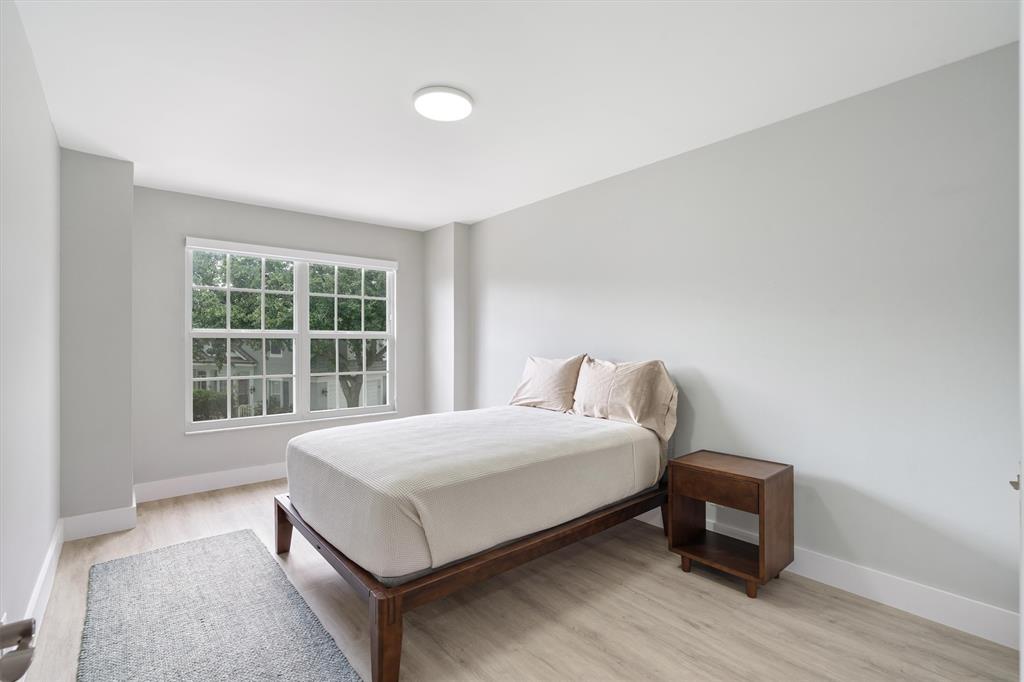 21470 St Andrews Grand Circle, Unit 12 Boca Raton, FL 33486 - Photo 20 of 26 a bedroom with a bed and a window