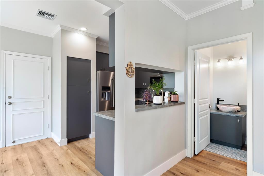 21470 St Andrews Grand Circle, Unit 12 Boca Raton, FL 33486 - Photo 9 of 26 a view of a kitchen from the hallway