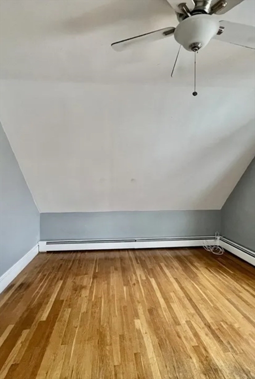 7 Beacon Street, Unit 3 Attleboro, MA 02703 - Photo 7 of 9 a view of a room with wooden floor and chair