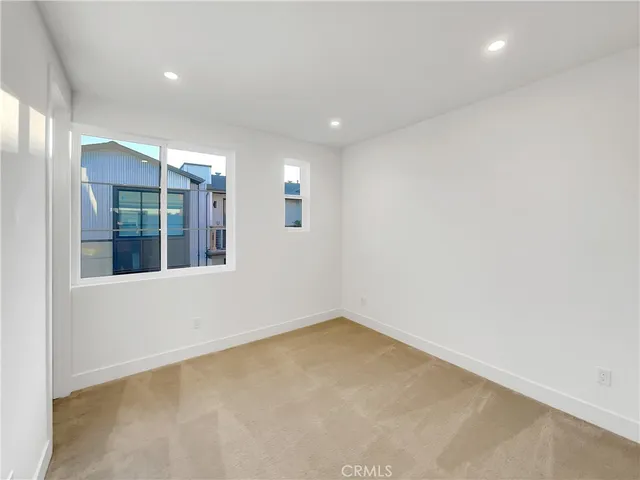 a bathroom with a bathtub and a toilet