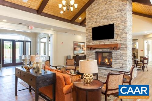 2170 Reserve Circle, Unit 4 Harrisonburg, VA 22801 - Photo 13 of 19 a living room with furniture a flat screen tv and a fireplace