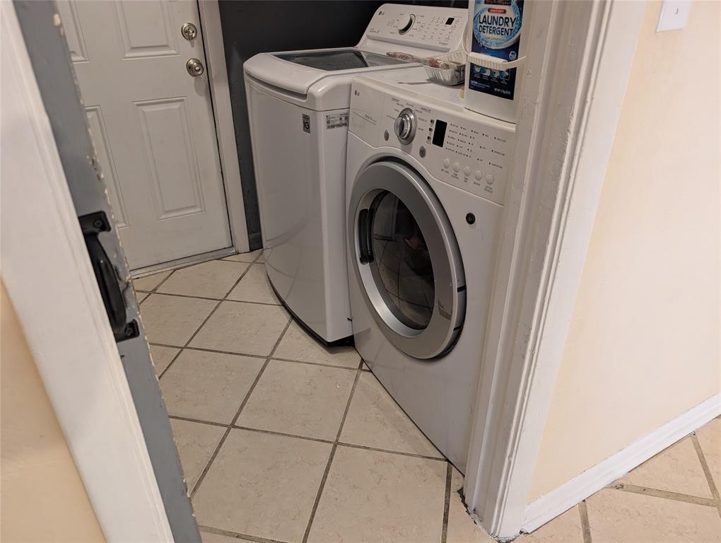 7502 Northwest 44th Court, Unit B Coral Springs, FL 33065 - Photo 15 of 15 a utility room with dryer and washer