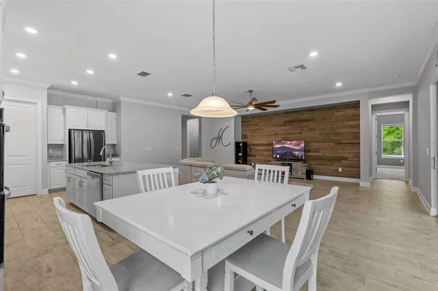 a view of a dining room with furniture