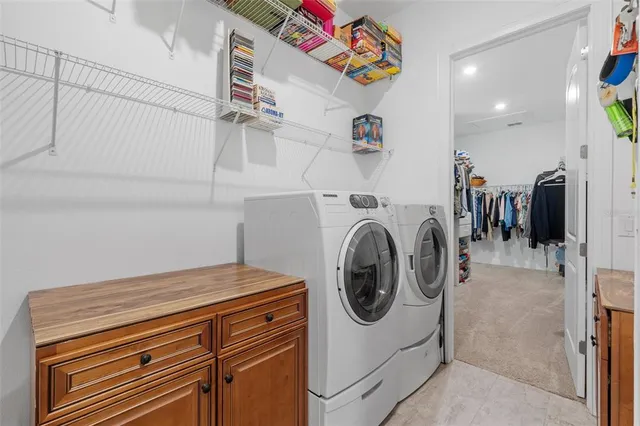 a utility room with dryer and washer