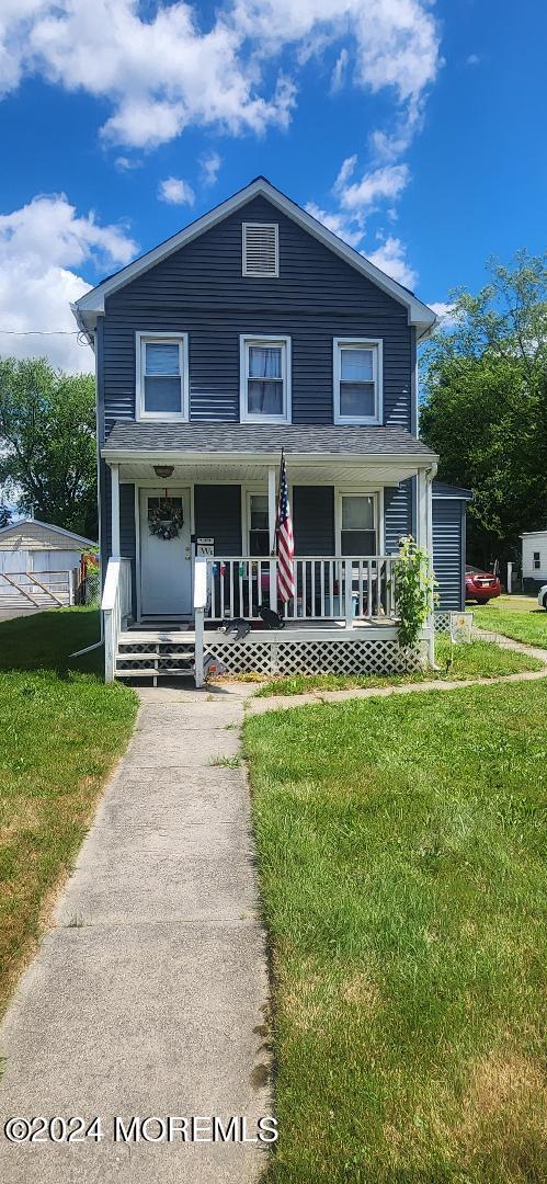 902 Adelphia Road Freehold, NJ 07728 - Photo 2 of 14 a house view with swimming pool and garden view