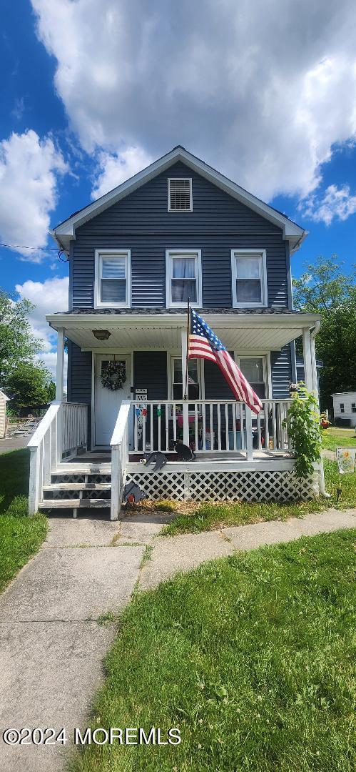 902 Adelphia Road Freehold, NJ 07728 - Photo 5 of 14 a front view of a house with a yard