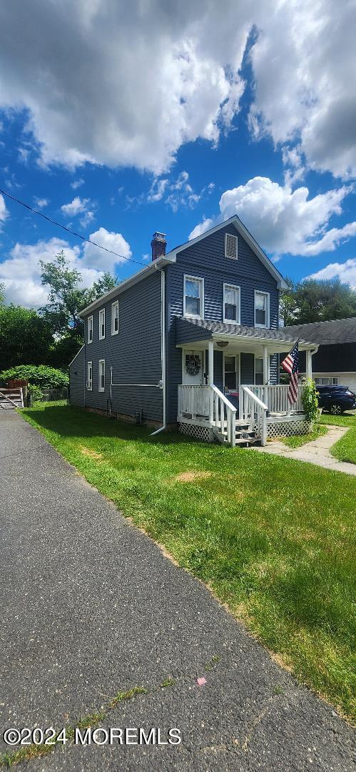 902 Adelphia Road Freehold, NJ 07728 - Photo 6 of 14 a view of a house with a yard