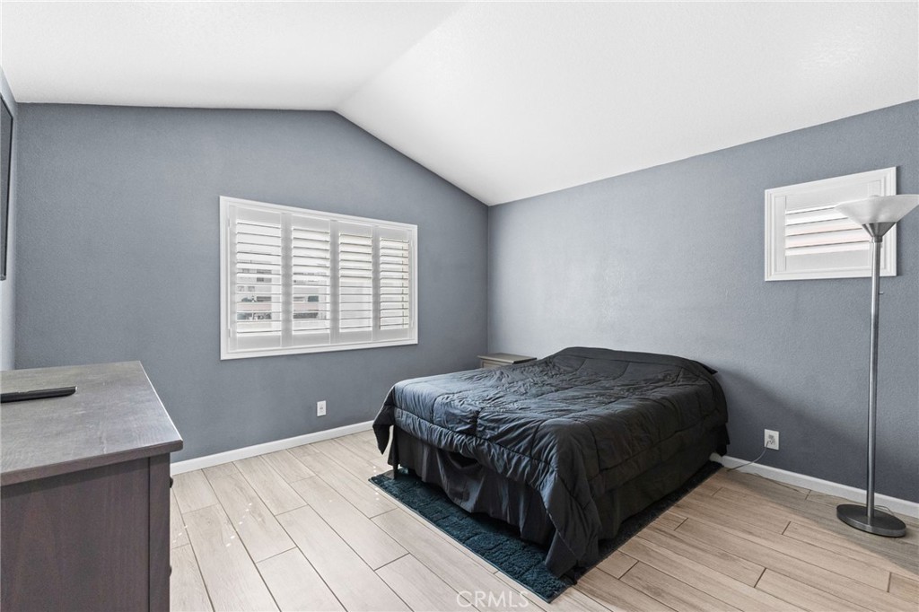 823 Pathfinder Way Corona, CA 92878 - Photo 27 of 59 a bedroom with a bed and window