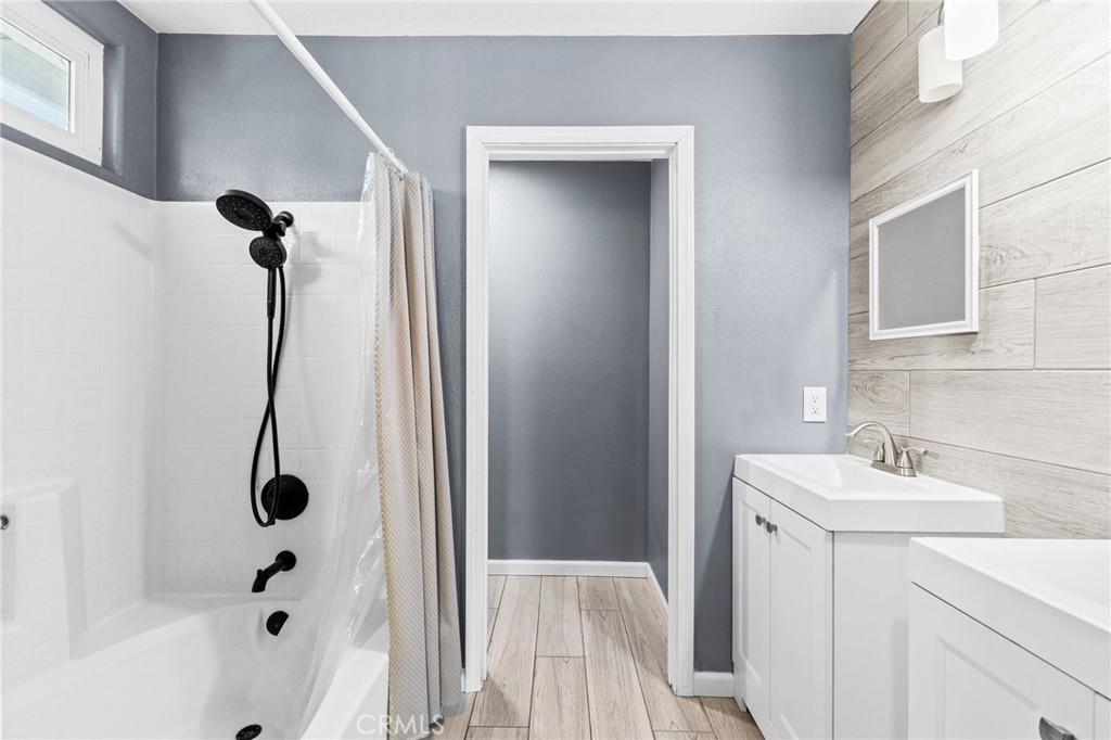 823 Pathfinder Way Corona, CA 92878 - Photo 33 of 59 a bathroom with a sink and a shower