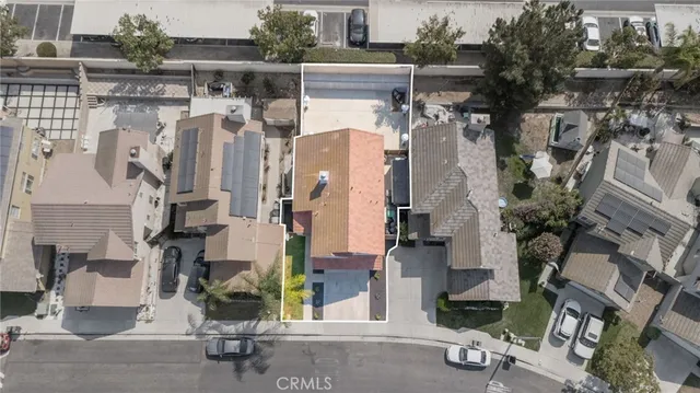 a view of a city with mountains in the background